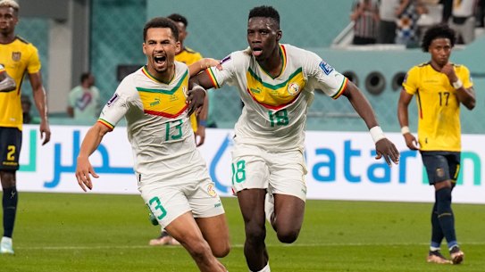 Senegal’s Ismaila Sarr (right) after burying a penalty against Ecuador.