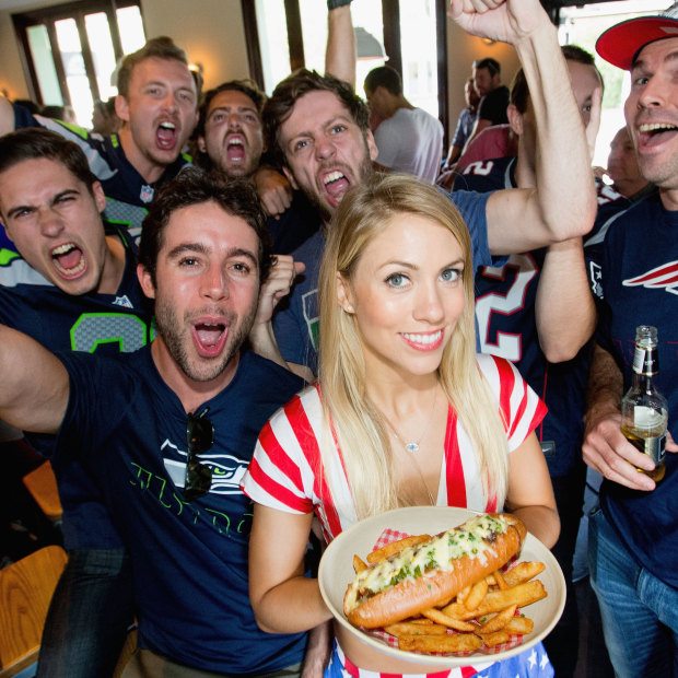 Waitress Emma King and Super Bowl fans in Paddington in 2015.