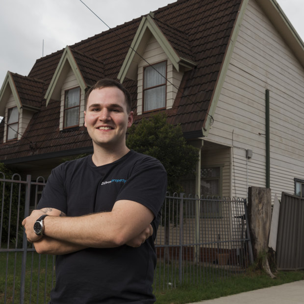 Eddie Dilleen, a 28-year-old property investor who bought 16 houses and apartments during the housing boom pictured outside one of his latest purchases in Wentworthville. 