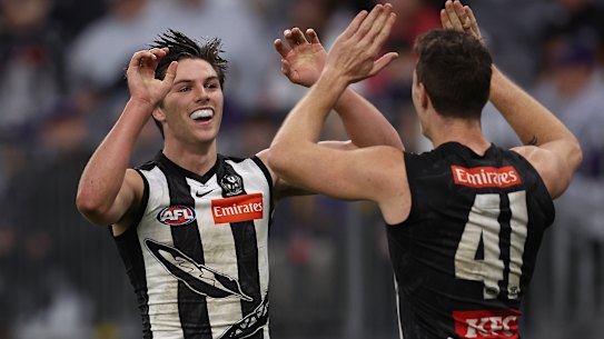 Oliver Henry celebrates a goal during the match.