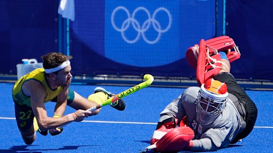 Flynn Ogilvie lands one of the penalties to help Australia to the semis in the men’s hockey competition. 