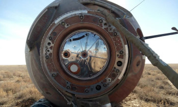 The Soyuz MS-10 space capsule lays in a field after an emergency landing near Dzhezkazgan, Kazakhstan, on Thursday.