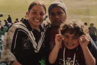 Parramatta star Isaiah Papali’i, when he was just six, with mum Lorina and dad Jerry at the 2004 Rugby League World Cup.