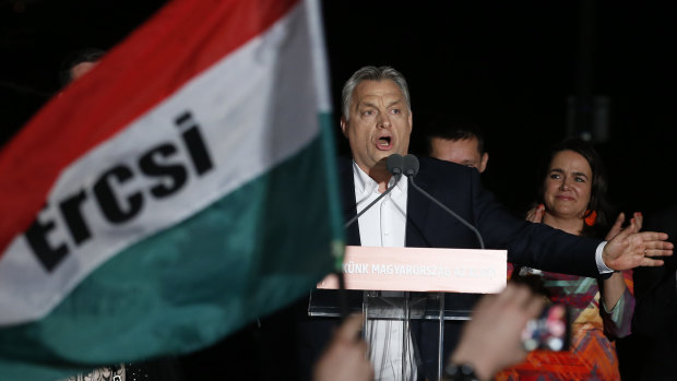 Hungarian Prime Minister Viktor Orban addresses his supporters in Budapest on Sunday.
