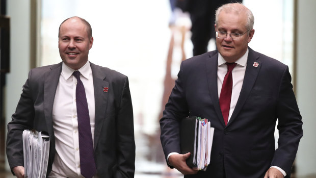 Treasurer Josh Frydenberg and Prime Minister Scott Morrison . The budget will be delivered on Tuesday.