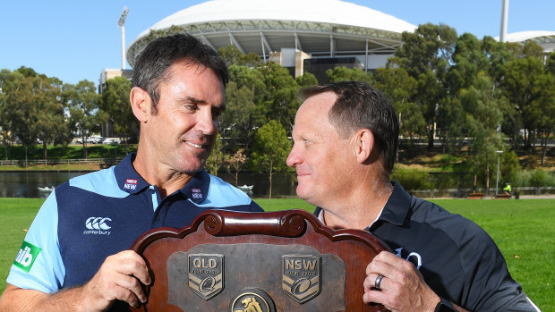 Let's get the party started ... NSW coach Brad Fittler, pictured here with Queensland counterpart Kevin Walters, wants Origin to restart the NRL season.