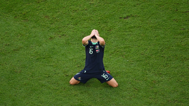 Aziz Behich celebrates Australia’s World Cup win over Tunisia.