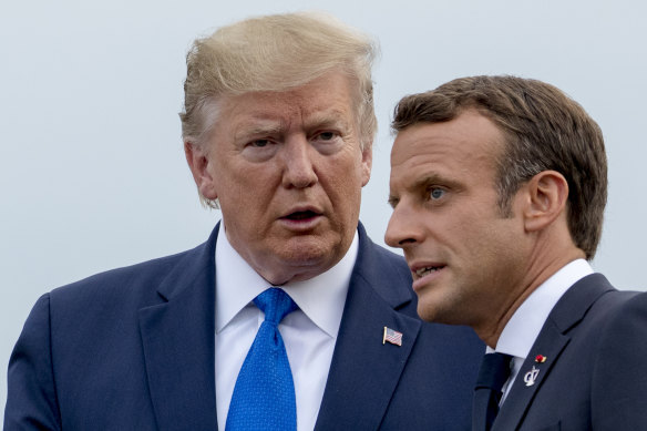 French President Emmanuel Macron, right, said the US under President Donald Trump appeared to be "turning its back on us".