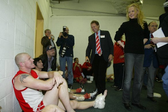 Nicole Kidman visits the Swans rooms after a game against Essendon at Stadium Australia in 2004.