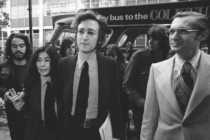 Yoko Ono, former Beatle John Lennon and attorney Leon Wildes leave the Immigration and Naturalisation Service in New York, 1972.