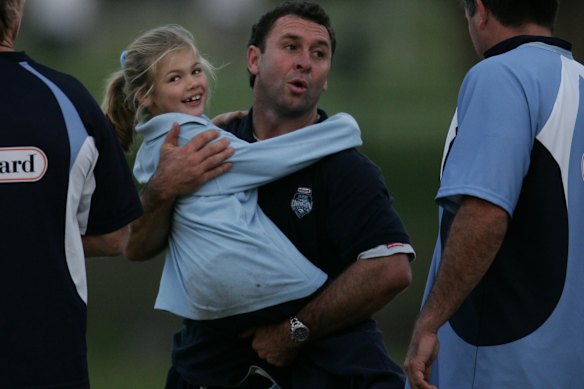 Ricky Stuart with his daughter Emma at a NSW training session in 2005.