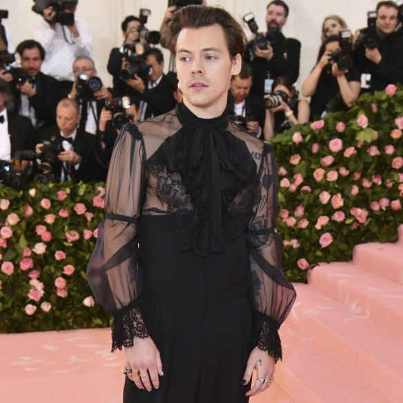 Harry Styles, laced up, at the Met Gala in 2019.