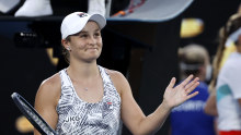 Ash Barty celebrates her win against Amanda Anisimova in the fourth round of the Australian Open on Sunday night. 