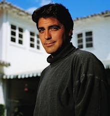 Actor George Clooney poses in grey turtleneck shirt. (Photo by  Tim Rue/CORBIS/Corbis via Getty Images)