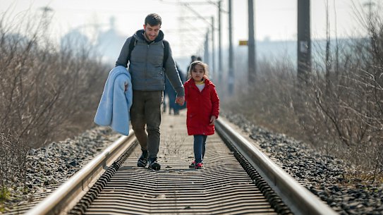 Migrants head for Greece near the Pazarakule border crossing in Edirne, Turkey on Sunday
