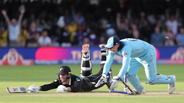 England’s Jos Buttler runs out New Zealand’s Martin Guptill during the super over at Lord’s four years ago.