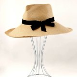 A classic Axel Mano straw hat is a signature item in Victoria’s wardrobe.