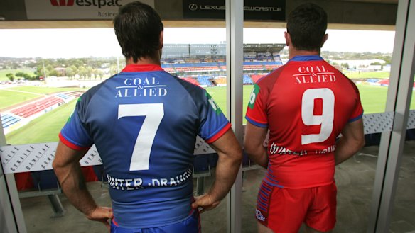 The old Newcastle Knights seven and nine partnership: Johns and Danny Buderus.