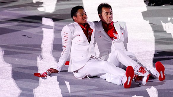 Indonesia athletes look on during the opening ceremony. 