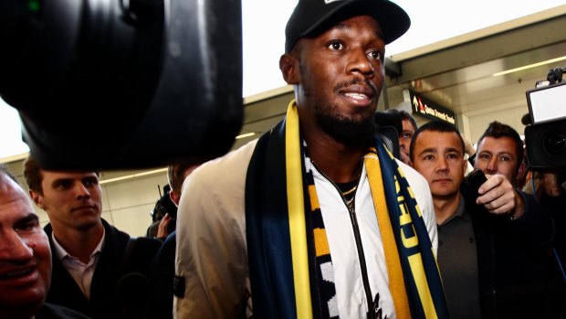 Time for action: Usain Bolt arrives in Sydney. 