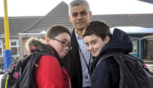 Razine (left) and Benedek (right), both aged 10, will carry backpacks fitted with a Dyson air sensor to measure air pollution. They are pictured with London mayor Sadiq Khan.