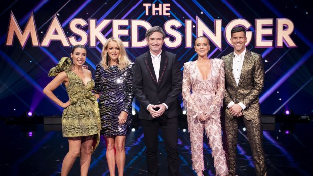 The Masked Singer Australia judges (from left) Dannii Minogue, Jackie O, Dave Hughes and Lindsay Lohan, with host Osher Günsberg. 