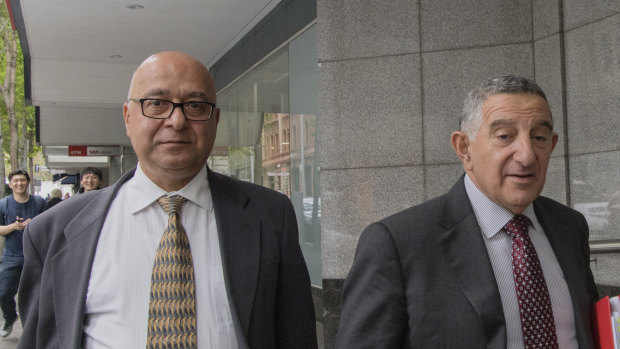 Bechara Khouri (left) leaves ICAC with his barrister Steve Stanton.