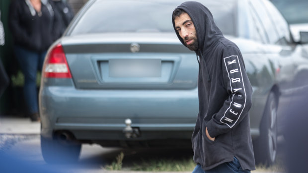 The brother of slain Meadow Heights man Ali Ali visits the scene of the shooting on Tuesday.