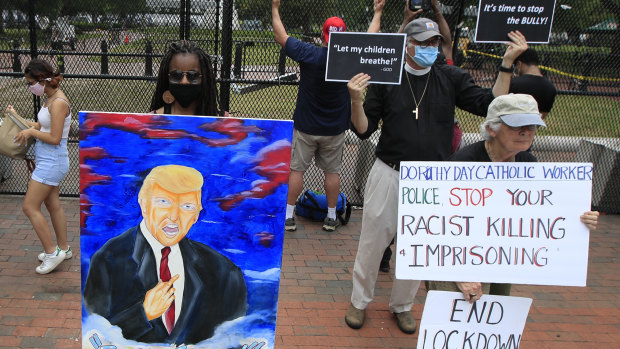 Protesters outside the White House on Friday.