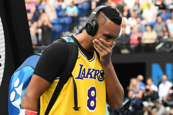 Nick Kyrgios was emotional as he arrived on Rod Laver Arena wearing a Kobe Bryant jersey.