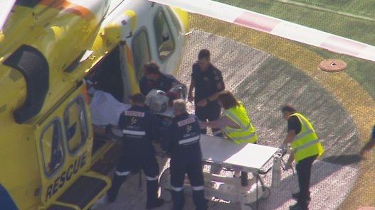 The woman was airlifted to hospital after suffering an animal bite.