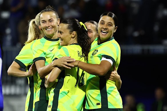 The Matildas celebrate scoring against Haiti.