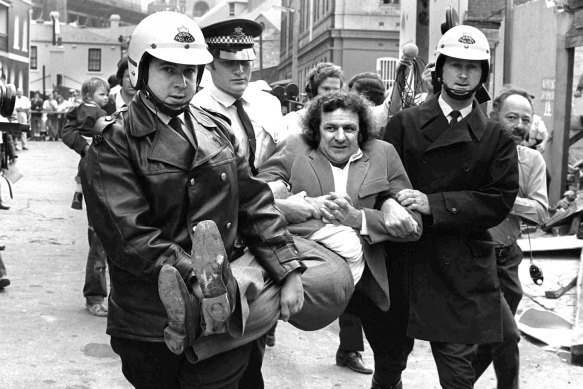 Jack Mundey being carried from a protest at The Rocks in the early seventies.