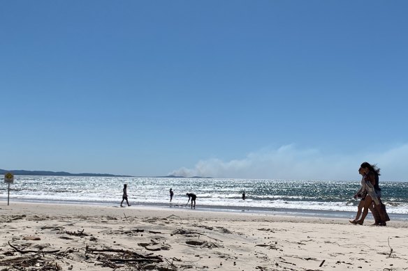 Smoke from a bushfire near Tweed Heads could be seen from Byron's Main Beach.