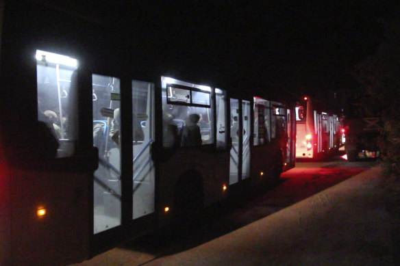 Ukrainian servicemen sit in buses after they left the besieged Mariupol’s Azovstal steel plant, near a penal colony in Olyonivka, in territory under the government of the Donetsk People’s Republic, eastern Ukraine.