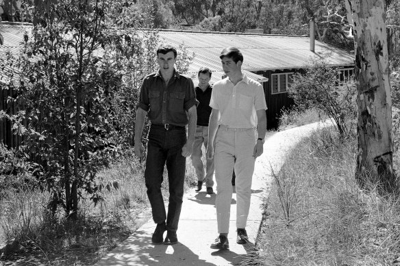 Charles, right, on his first inspection of Timbertop in February 1966. 
