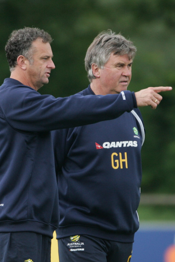 Arnold with world soccer giant Guus Hiddink, who taught him that tactics come second to how coaches manage players.