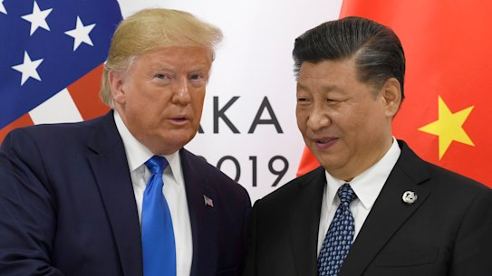 US President Donald Trump poses for a photo with Chinese President Xi Jinping during a meeting on the sidelines of the G-20 summit in Osaka in 2019.