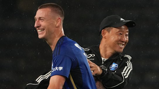 Mitchell Duke with Machida Zelvia coach Go Kuroda, who has the newly-promoted side on top of the J1.League table with 11 rounds to go.