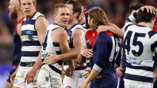 Geelong skipper Joel Selwood trades words with the Demons’ Ed Langdon.