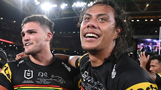 Nathan Cleary and Jarome Luai embrace after the Panthers’ victory in the 2021 NRL grand final at Suncorp Stadium.
