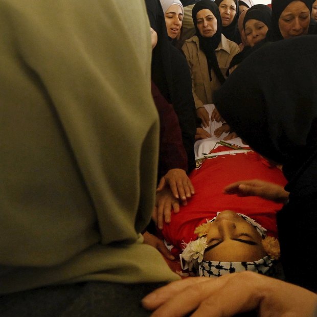 Female mourners during the funeral of Sohaib Al-Sous, 15, held at the family home in Beitunia, on the outskirts of Ramallah. 