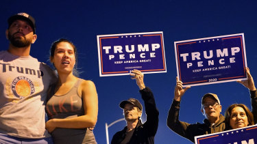 Supporters of President Donald Trump protest the Nevada vote in front of the Clark County Election Department in Las Vegas.