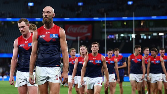 Max Gawn leads the beaten Demons from the field.
