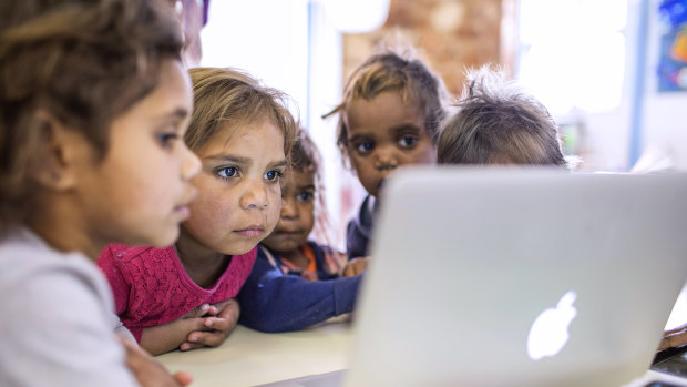 Young learners from the remote Aṉangu Pitjantjatjara Yankunytjatjara (APY) Lands of South Australia using technology at school.