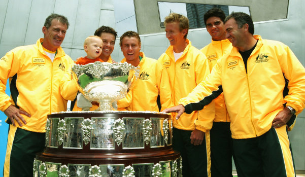 Wayne Arthurs, third from right, flanked by Lleyton Hewitt and Mark Philippoussis, with the 2003 Davis Cup trophy.