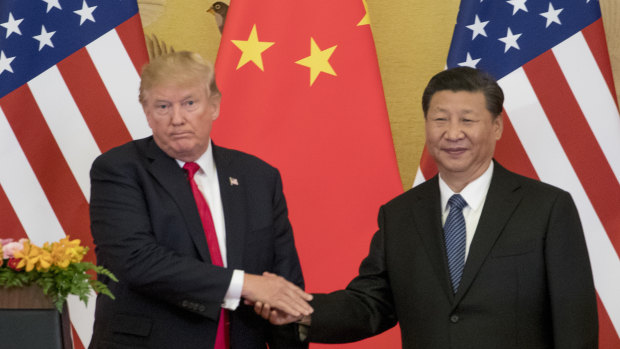 Donald Trump says he is the one holding up a trade pact with China. 