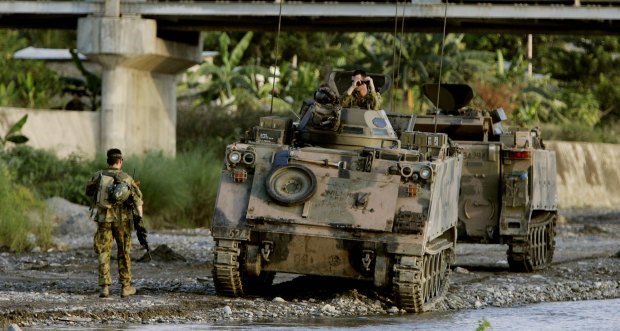 Australian soldiers on patrol in Dili, East Timor in 2006.