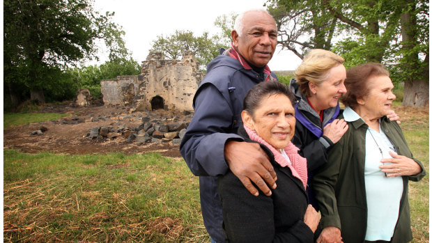 Then Indigenous affairs minister Jenny Macklin with Gunditjmara elders (left to right) Ken Saunders, Euphemia Day and June Gill in front of one of the homes on the mission after their native title victory in 2008.