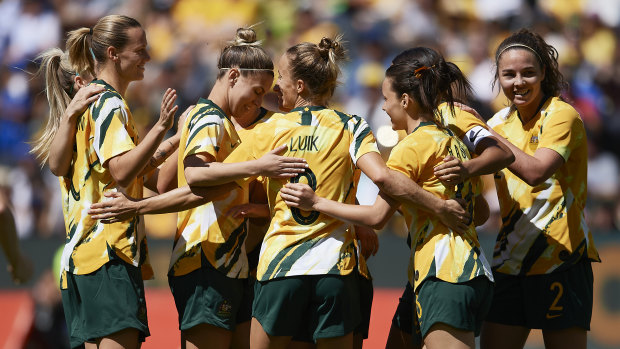 The Matildas celebrate a goal this month against Chile. 